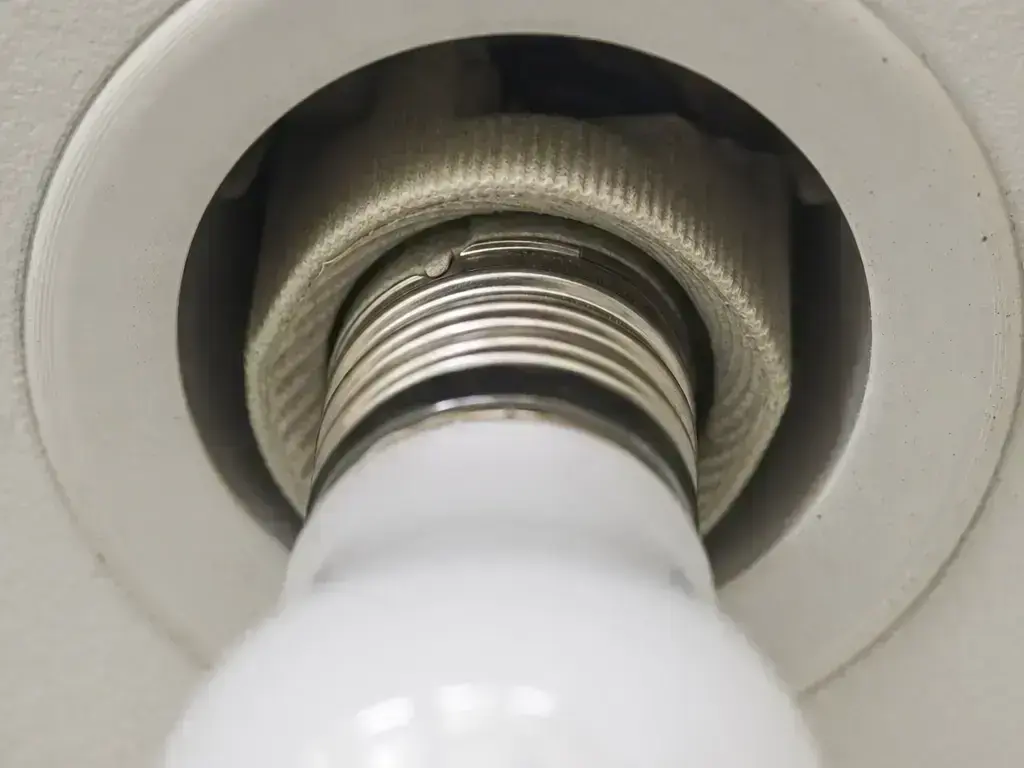 Electrician checking grounding on panel upgrade